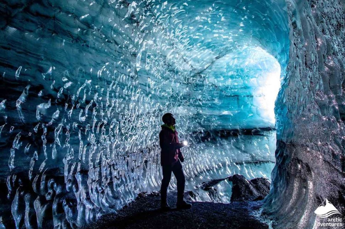 katla ice cave iceland 2024 man observing the ice cave